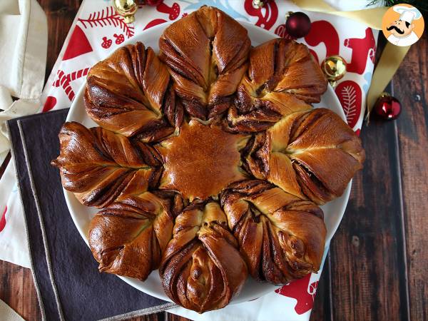 Brioche lumihiutale levitteellä